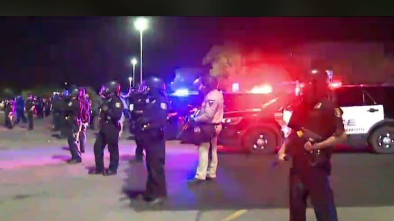 Police line attempts to disperse crowd at Empire Mall