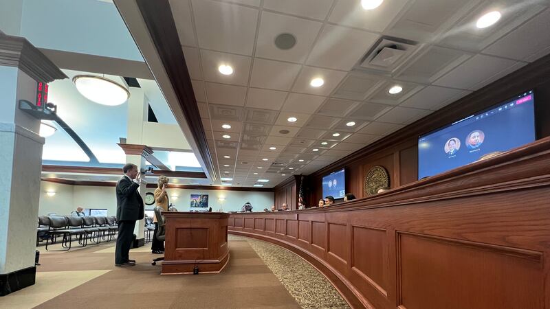 State's Attorneys Michael Moore and Emily Sovell are sworn in to testify before the South...