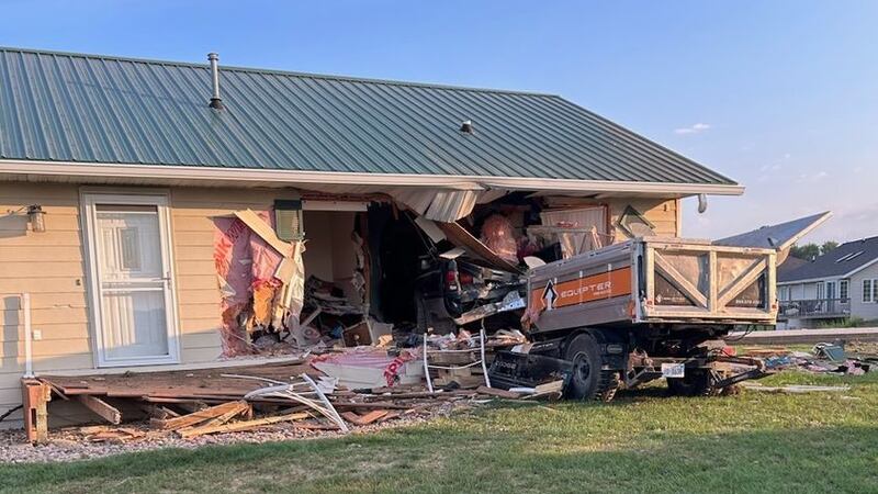 Six injured after truck crashes into Iowa home