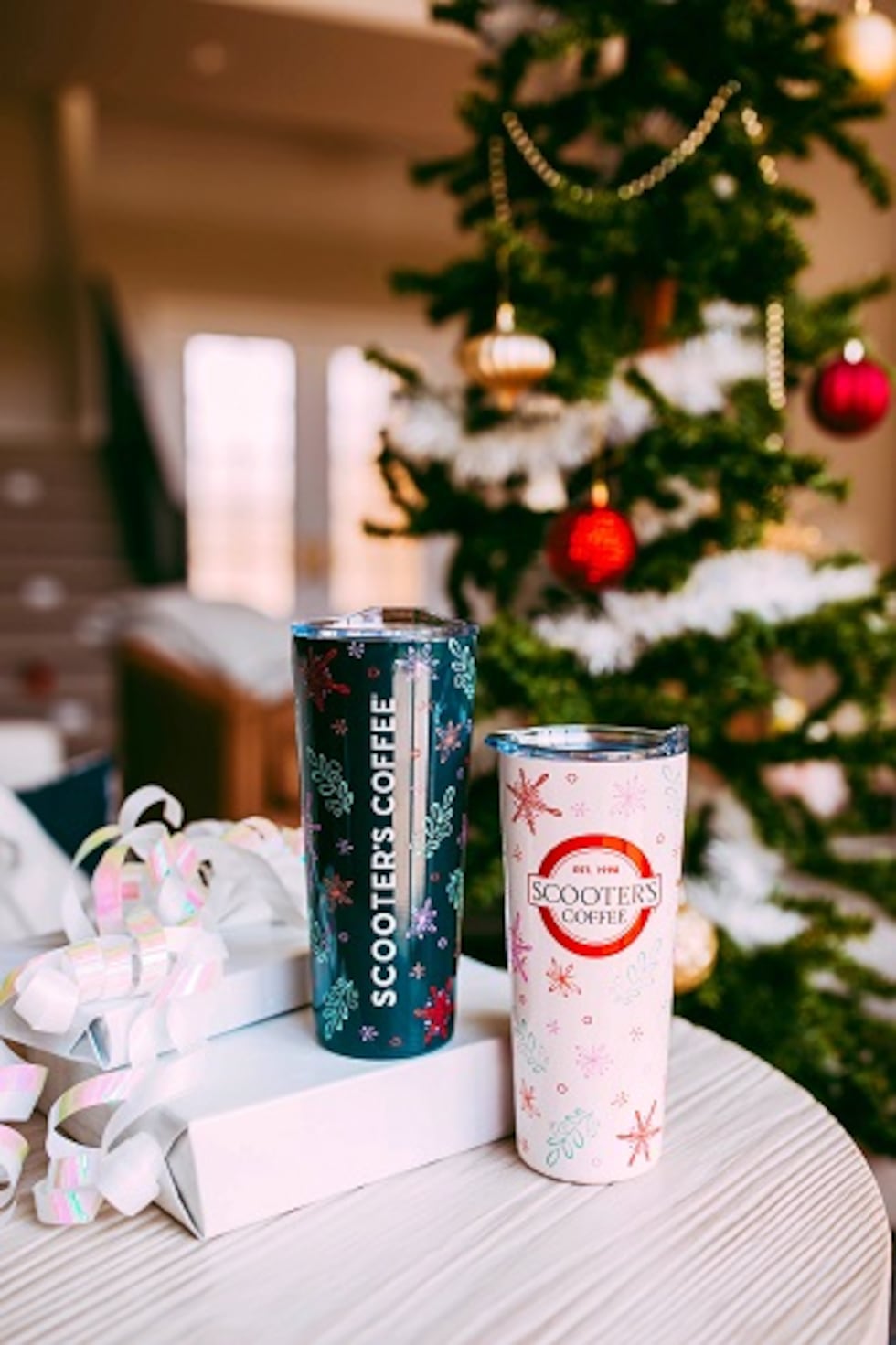 Berry & Bright Holiday Tumblers: Those who enjoy their coffee and drinks on the go can sip in...