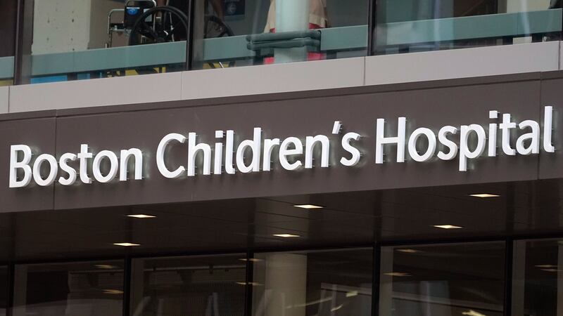 FILE - A sign hangs on Boston Children's Hospital, Thursday, Aug. 18, 2022, in Boston. A...